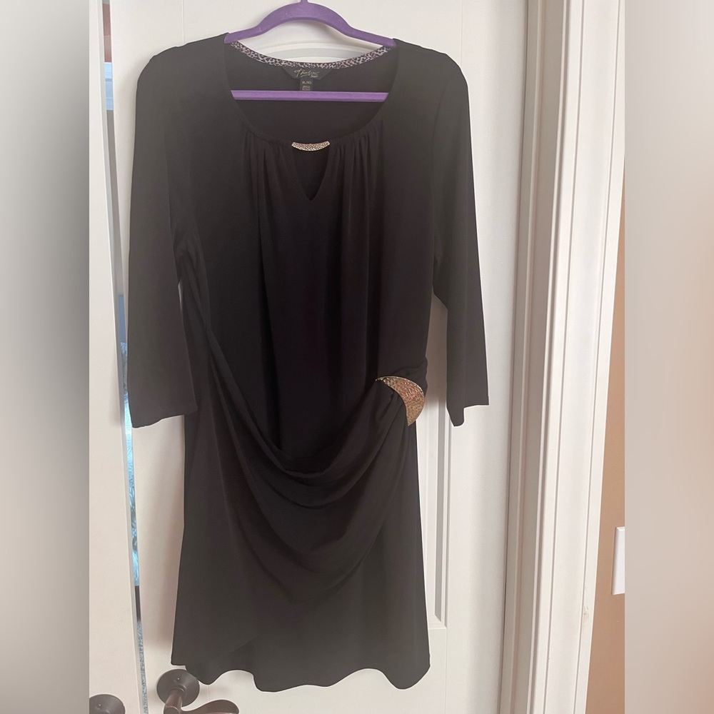 Black dress with gold hardware